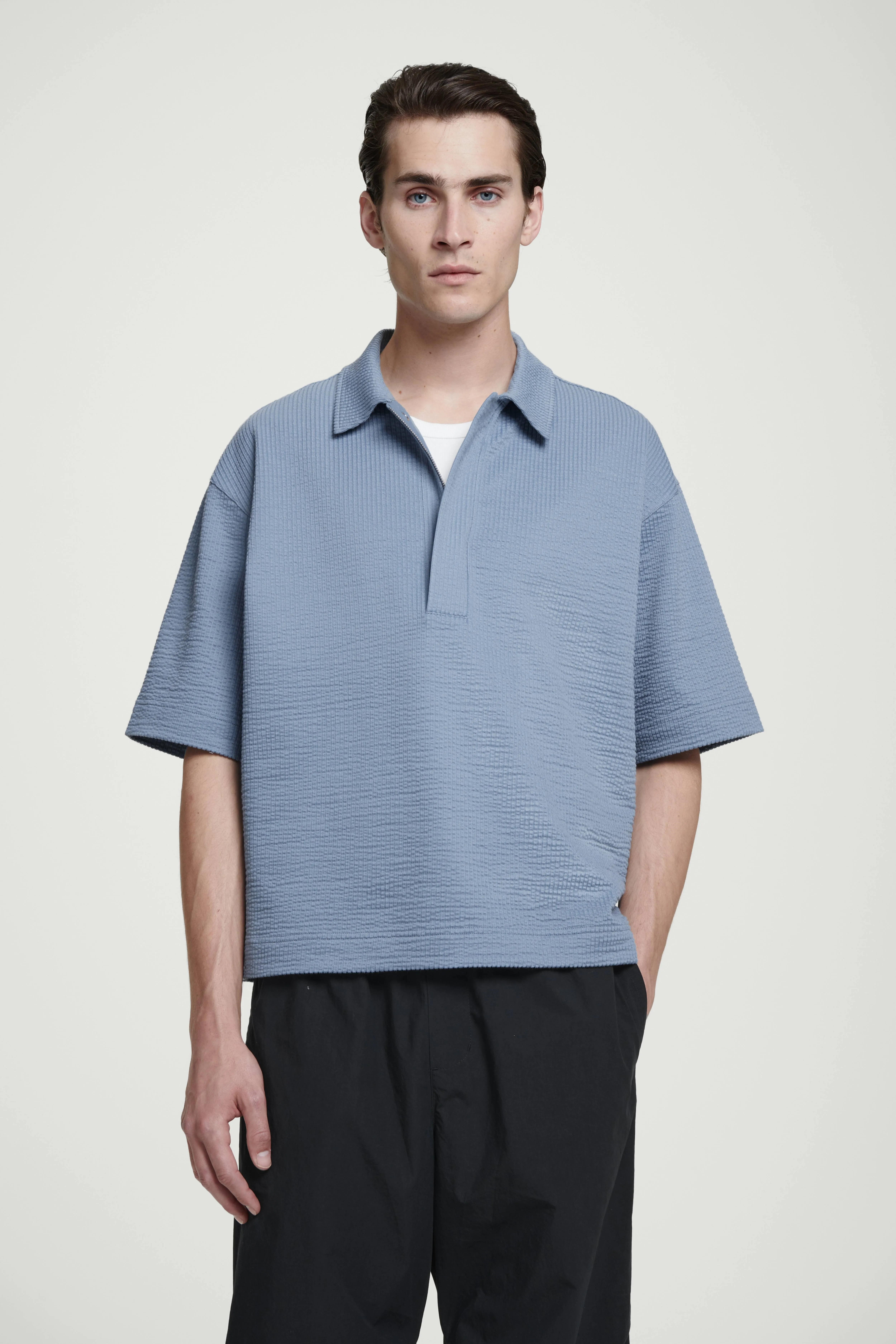 SEERSUCKER HALF-ZIP POLO SHIRT - Round neck - Short sleeve - LIGHT BLUE - Men | H&M GB