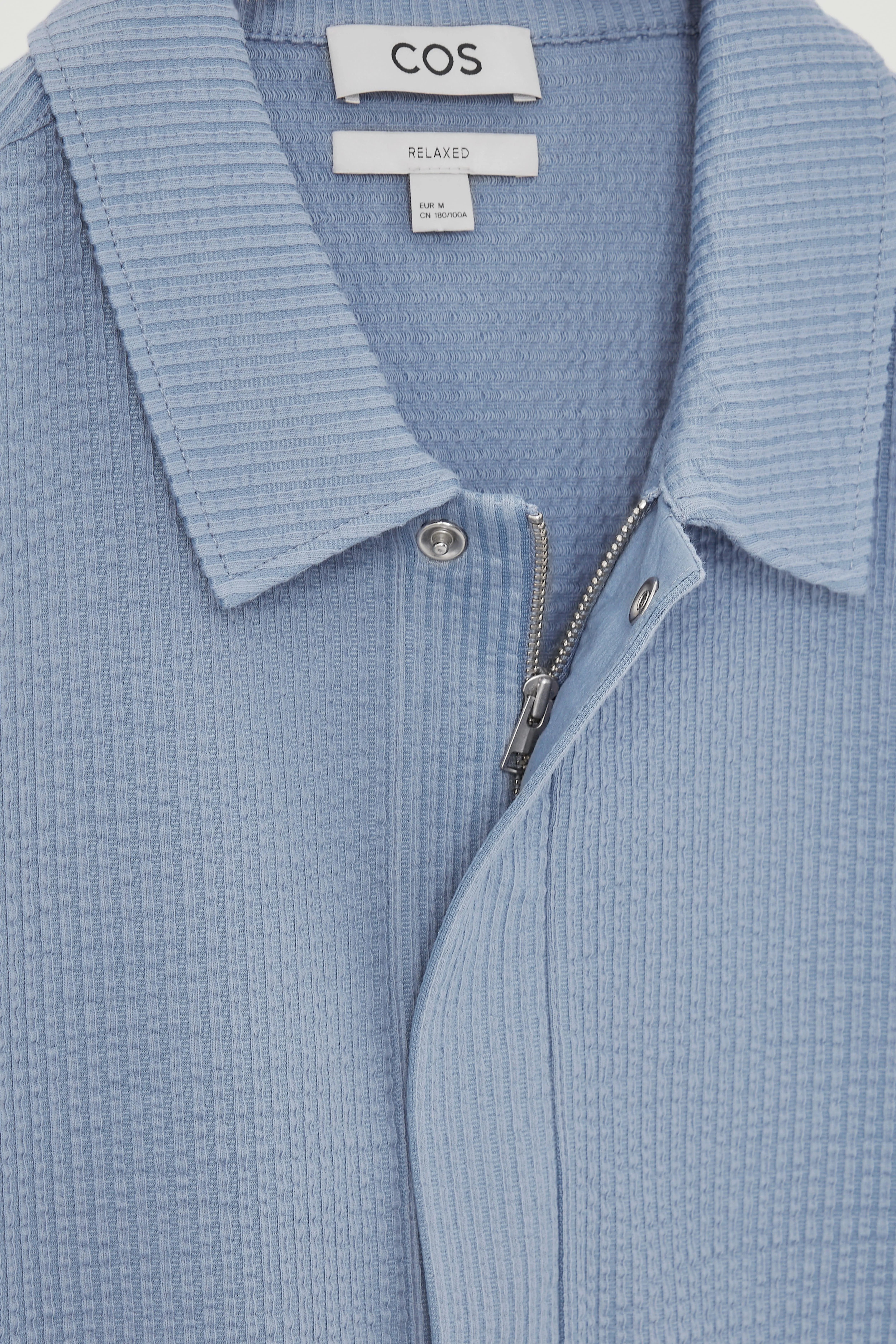 SEERSUCKER HALF-ZIP POLO SHIRT - Round neck - Short sleeve - LIGHT BLUE - Men | H&M GB